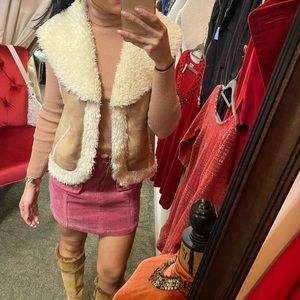 Suede and faux shearling vintage vest with clasps for closure